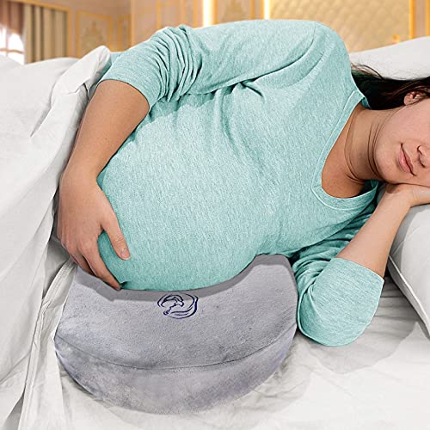 Woman sleeping on side on her Dr Cloud wedge pregnancy pillow
